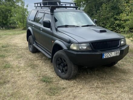 Мицубиси Паджеро Спорт 2002 в Тальном на Automoto.ua Черный Мицубиси Паджеро Спорт, объемом двигателя 2.5 л и пробегом 200 тыс. км за 3600 $, фото 1 на Automoto.ua