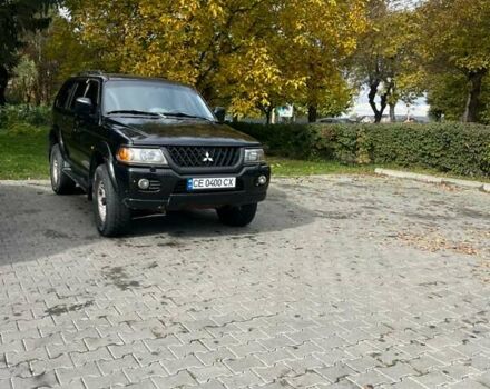Черный Мицубиси Паджеро Спорт, объемом двигателя 3 л и пробегом 313 тыс. км за 6999 $, фото 1 на Automoto.ua