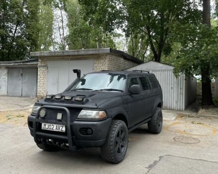 Черный Мицубиси Паджеро Спорт, объемом двигателя 2.5 л и пробегом 333 тыс. км за 4500 $, фото 1 на Automoto.ua