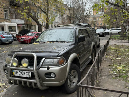 Черный Мицубиси Паджеро Спорт, объемом двигателя 2.97 л и пробегом 290 тыс. км за 7200 $, фото 1 на Automoto.ua