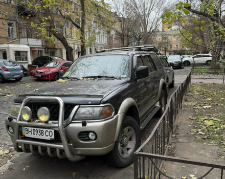 Черный Мицубиси Паджеро Спорт, объемом двигателя 2.97 л и пробегом 290 тыс. км за 7200 $, фото 1 на Automoto.ua
