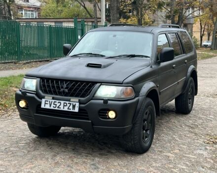 Черный Мицубиси Паджеро Спорт, объемом двигателя 2.5 л и пробегом 182 тыс. км за 3500 $, фото 1 на Automoto.ua