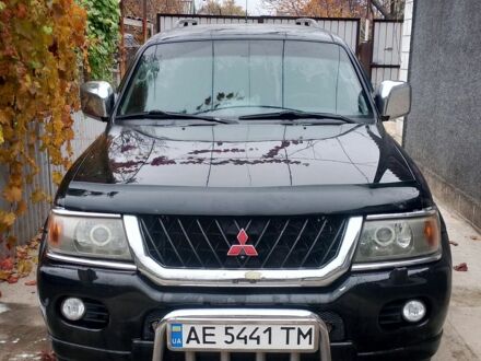 Чорний Міцубісі Паджеро Спорт, об'ємом двигуна 3 л та пробігом 300 тис. км за 7500 $, фото 1 на Automoto.ua