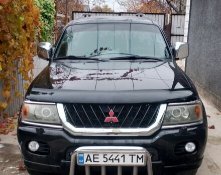 Чорний Міцубісі Паджеро Спорт, об'ємом двигуна 3 л та пробігом 300 тис. км за 7500 $, фото 1 на Automoto.ua