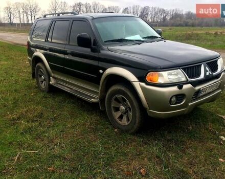 Черный Мицубиси Паджеро Спорт, объемом двигателя 3 л и пробегом 383 тыс. км за 7000 $, фото 1 на Automoto.ua