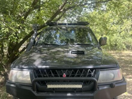 Мицубиси Паджеро Спорт 2004 в Изюме на Automoto.ua Черный Мицубиси Паджеро Спорт, объемом двигателя 2.5 л и пробегом 333 тыс. км за 3650 $, фото 1 на Automoto.ua