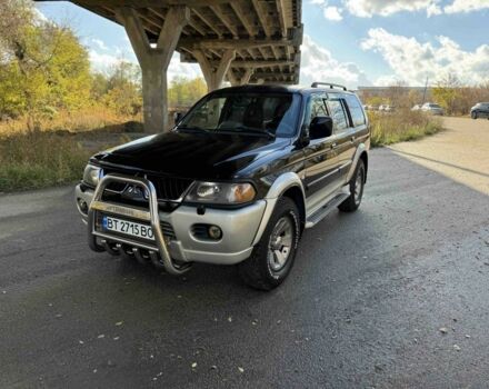 Черный Мицубиси Паджеро Спорт, объемом двигателя 3 л и пробегом 293 тыс. км за 4599 $, фото 1 на Automoto.ua