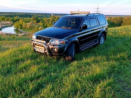 Чорний Міцубісі Паджеро Спорт, об'ємом двигуна 3 л та пробігом 300 тис. км за 8000 $, фото 1 на Automoto.ua