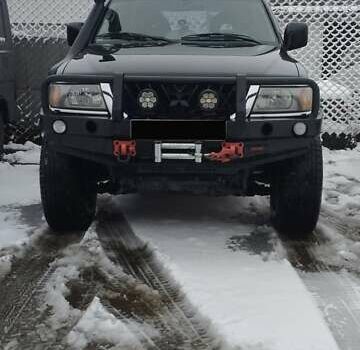 Черный Мицубиси Паджеро Спорт, объемом двигателя 3 л и пробегом 370 тыс. км за 10500 $, фото 1 на Automoto.ua