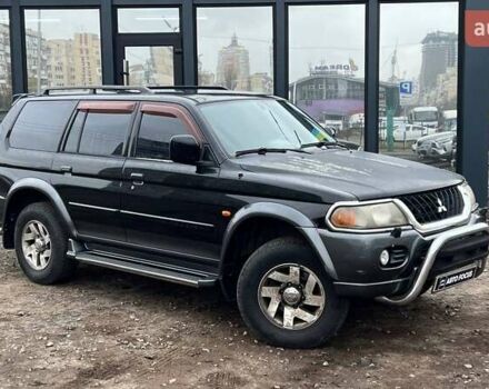 Черный Мицубиси Паджеро Спорт, объемом двигателя 3 л и пробегом 239 тыс. км за 7790 $, фото 1 на Automoto.ua