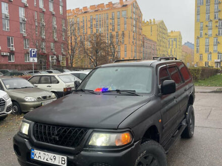Черный Мицубиси Паджеро Спорт, объемом двигателя 3 л и пробегом 300 тыс. км за 5300 $, фото 1 на Automoto.ua