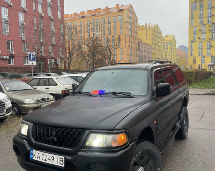 Черный Мицубиси Паджеро Спорт, объемом двигателя 3 л и пробегом 300 тыс. км за 5300 $, фото 1 на Automoto.ua