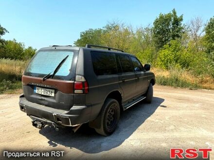 Черный Мицубиси Паджеро Спорт, объемом двигателя 2.5 л и пробегом 187 тыс. км за 3900 $, фото 1 на Automoto.ua