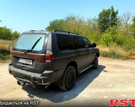 Чорний Міцубісі Паджеро Спорт, об'ємом двигуна 2.5 л та пробігом 187 тис. км за 3900 $, фото 1 на Automoto.ua