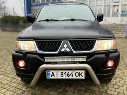 Чорний Міцубісі Паджеро Спорт, об'ємом двигуна 3 л та пробігом 200 тис. км за 5500 $, фото 1 на Automoto.ua