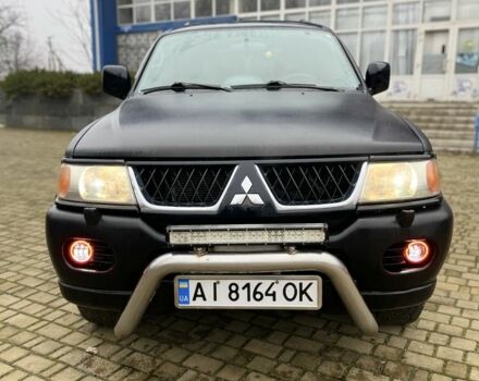 Черный Мицубиси Паджеро Спорт, объемом двигателя 3 л и пробегом 200 тыс. км за 5500 $, фото 1 на Automoto.ua