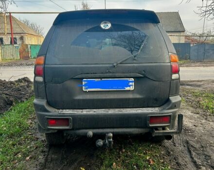 Черный Мицубиси Паджеро Спорт, объемом двигателя 3 л и пробегом 300 тыс. км за 5500 $, фото 1 на Automoto.ua