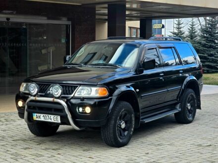 Чорний Міцубісі Паджеро Спорт, об'ємом двигуна 3 л та пробігом 250 тис. км за 6200 $, фото 1 на Automoto.ua