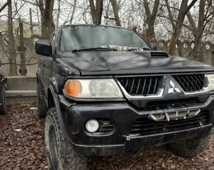Черный Мицубиси Паджеро Спорт, объемом двигателя 2.5 л и пробегом 200 тыс. км за 4200 $, фото 1 на Automoto.ua
