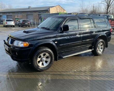 Чорний Міцубісі Паджеро Спорт, об'ємом двигуна 2.5 л та пробігом 209 тис. км за 8300 $, фото 1 на Automoto.ua