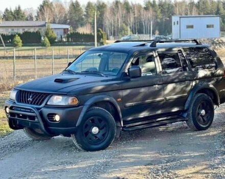 Черный Мицубиси Паджеро Спорт, объемом двигателя 2.5 л и пробегом 239 тыс. км за 2950 $, фото 1 на Automoto.ua