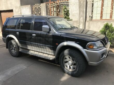 Чорний Міцубісі Паджеро Спорт, об'ємом двигуна 0 л та пробігом 320 тис. км за 7999 $, фото 1 на Automoto.ua