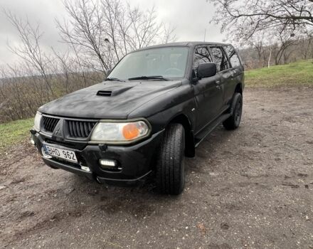 Черный Мицубиси Паджеро Спорт, объемом двигателя 2.5 л и пробегом 402 тыс. км за 4200 $, фото 1 на Automoto.ua