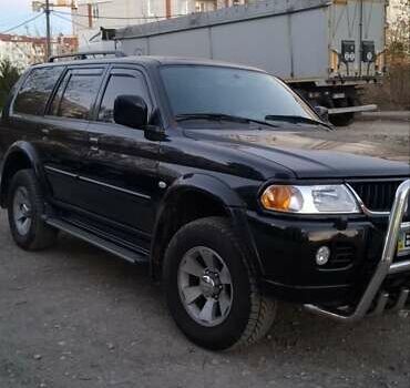Чорний Міцубісі Паджеро Спорт, об'ємом двигуна 2.97 л та пробігом 215 тис. км за 7500 $, фото 1 на Automoto.ua