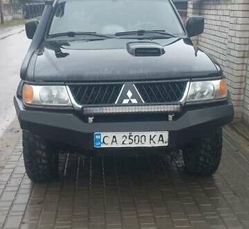 Черный Мицубиси Паджеро Спорт, объемом двигателя 2.5 л и пробегом 220 тыс. км за 10200 $, фото 1 на Automoto.ua