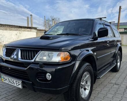 Черный Мицубиси Паджеро Спорт, объемом двигателя 2.5 л и пробегом 225 тыс. км за 9500 $, фото 1 на Automoto.ua