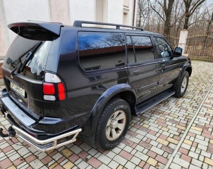 Чорний Міцубісі Паджеро Спорт, об'ємом двигуна 3 л та пробігом 145 тис. км за 9000 $, фото 1 на Automoto.ua