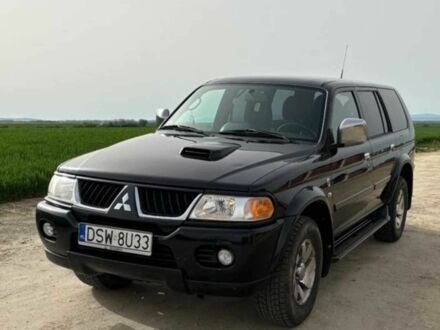 Чорний Міцубісі Паджеро Спорт, об'ємом двигуна 2.5 л та пробігом 308 тис. км за 4800 $, фото 1 на Automoto.ua