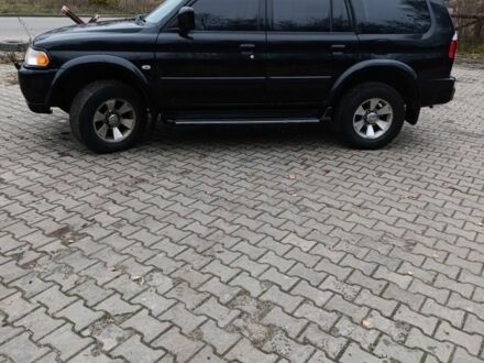 Черный Мицубиси Паджеро Спорт, объемом двигателя 3 л и пробегом 238 тыс. км за 8500 $, фото 1 на Automoto.ua