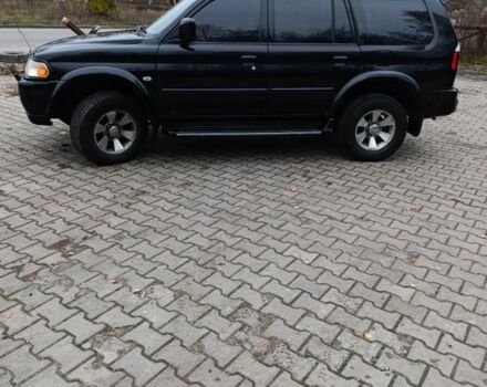 Чорний Міцубісі Паджеро Спорт, об'ємом двигуна 3 л та пробігом 238 тис. км за 8500 $, фото 1 на Automoto.ua