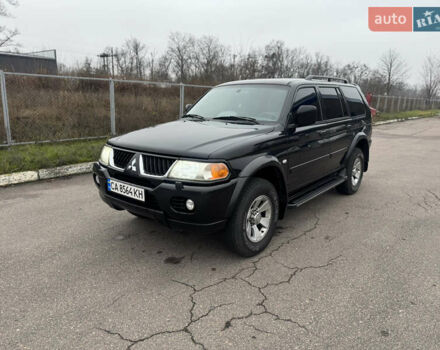 Черный Мицубиси Паджеро Спорт, объемом двигателя 3 л и пробегом 240 тыс. км за 8500 $, фото 1 на Automoto.ua