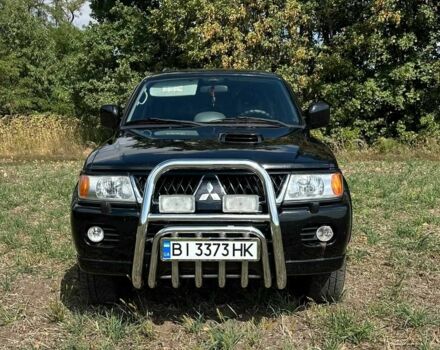 Черный Мицубиси Паджеро Спорт, объемом двигателя 2.5 л и пробегом 127 тыс. км за 14800 $, фото 1 на Automoto.ua