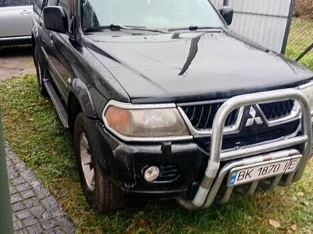 Черный Мицубиси Паджеро Спорт, объемом двигателя 2.97 л и пробегом 230 тыс. км за 9500 $, фото 1 на Automoto.ua