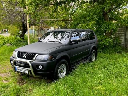 Чорний Міцубісі Паджеро Спорт, об'ємом двигуна 3 л та пробігом 240 тис. км за 8300 $, фото 1 на Automoto.ua