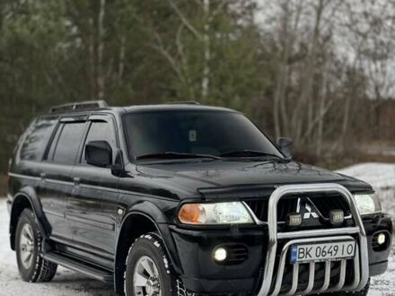 Чорний Міцубісі Паджеро Спорт, об'ємом двигуна 3 л та пробігом 267 тис. км за 8500 $, фото 1 на Automoto.ua