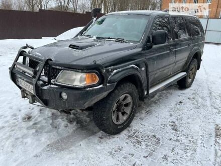 Чорний Міцубісі Паджеро Спорт, об'ємом двигуна 2.5 л та пробігом 264 тис. км за 11450 $, фото 1 на Automoto.ua