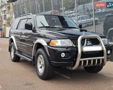 Чорний Міцубісі Паджеро Спорт, об'ємом двигуна 2.5 л та пробігом 345 тис. км за 9900 $, фото 1 на Automoto.ua