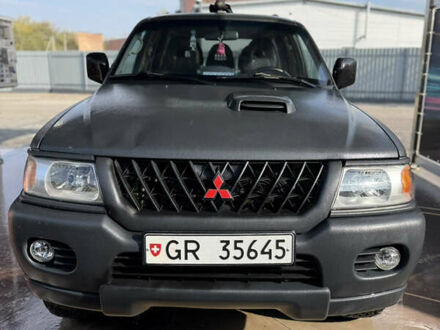 Черный Мицубиси Паджеро Спорт, объемом двигателя 2.5 л и пробегом 330 тыс. км за 7000 $, фото 1 на Automoto.ua