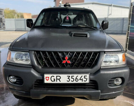Чорний Міцубісі Паджеро Спорт, об'ємом двигуна 2.5 л та пробігом 330 тис. км за 7000 $, фото 1 на Automoto.ua
