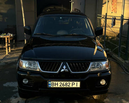 Чорний Міцубісі Паджеро Спорт, об'ємом двигуна 3 л та пробігом 148 тис. км за 9000 $, фото 1 на Automoto.ua