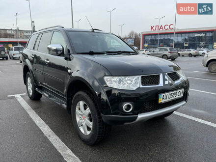 Черный Мицубиси Паджеро Спорт, объемом двигателя 2.5 л и пробегом 219 тыс. км за 12000 $, фото 1 на Automoto.ua