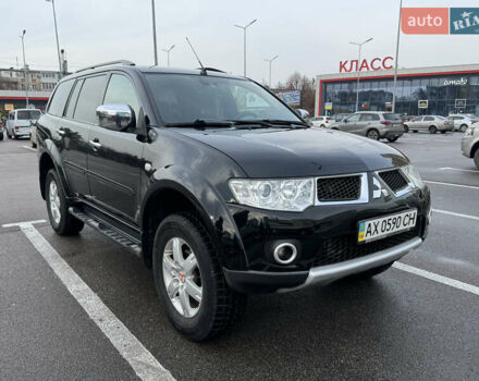 Черный Мицубиси Паджеро Спорт, объемом двигателя 2.5 л и пробегом 219 тыс. км за 12000 $, фото 1 на Automoto.ua