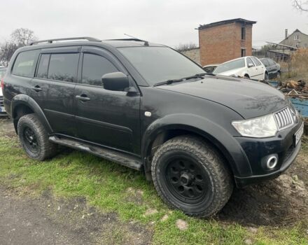 Чорний Міцубісі Паджеро Спорт, об'ємом двигуна 2.5 л та пробігом 199 тис. км за 10000 $, фото 1 на Automoto.ua