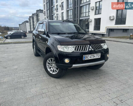 Чорний Міцубісі Паджеро Спорт, об'ємом двигуна 2.48 л та пробігом 221 тис. км за 15000 $, фото 1 на Automoto.ua