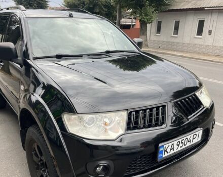 Черный Мицубиси Паджеро Спорт, объемом двигателя 2.5 л и пробегом 200 тыс. км за 6000 $, фото 1 на Automoto.ua