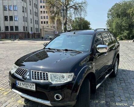 Чорний Міцубісі Паджеро Спорт, об'ємом двигуна 2.48 л та пробігом 164 тис. км за 15800 $, фото 1 на Automoto.ua